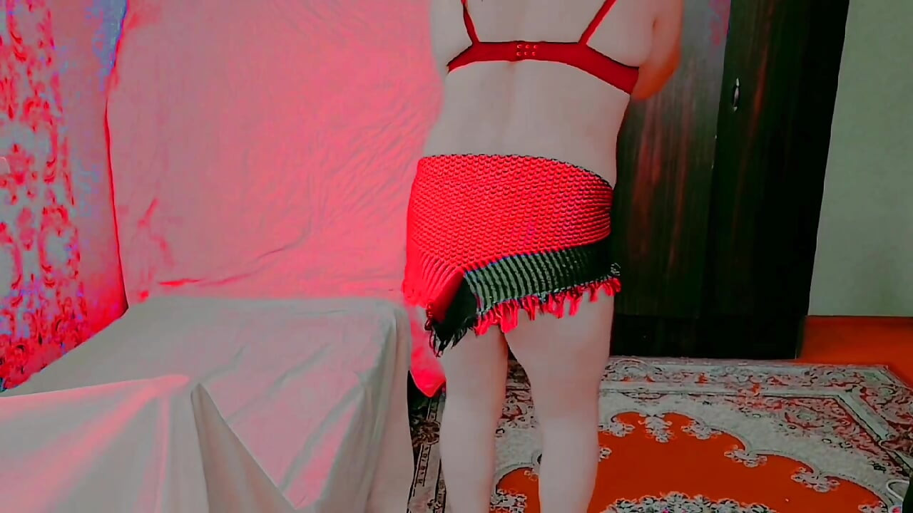 Femboy showing waistline in cropped hoodie and skirt
