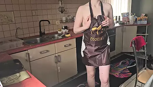 Sexy wife in the kitchen cooking naked