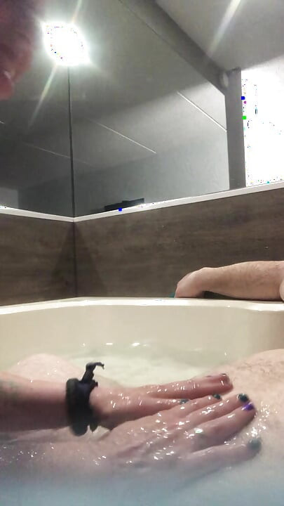 Flab fun in a jacuzzi! Slim n sexy Rachel Wriggler has slippy sliding soapy fun with a big chubby bear