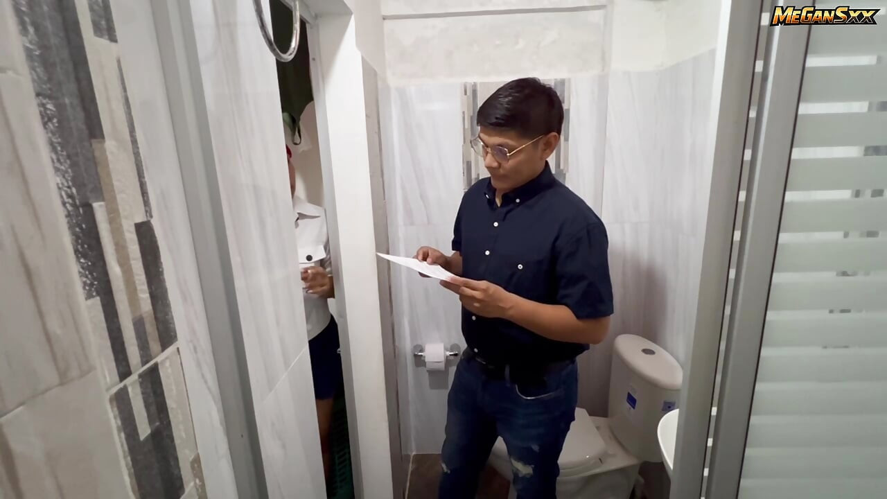 Teacher his student in the bathroom.