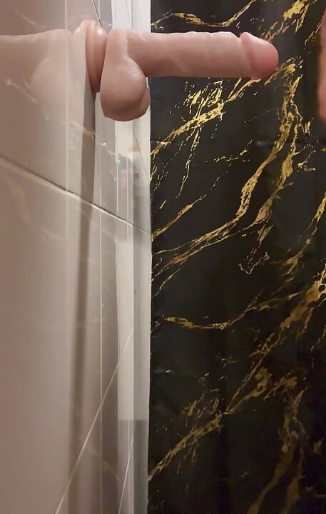 Sucking a Big DILDO Cock in the Bathroom