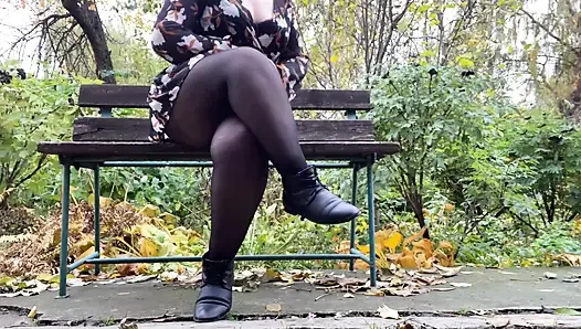 Mature stepmother undresses outdoors