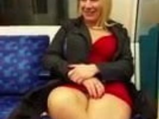 MILF with nice thighs showing herself in train