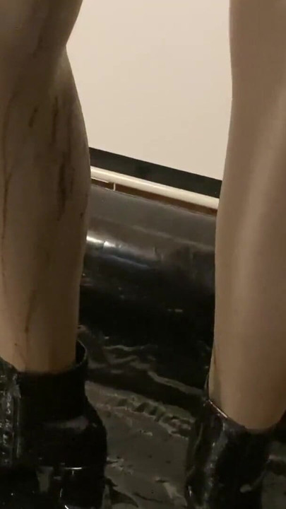 Iconic moment from "Spandex, Nylons, Heels Pissing and Masturbation Bondage"