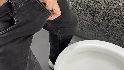 Hairy daddy's thick 9-inch cock exploding in the bathroom freeballing in jeans