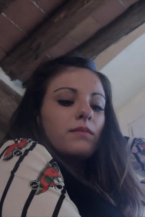 Brunette teen Bianca takes high heels off her feet