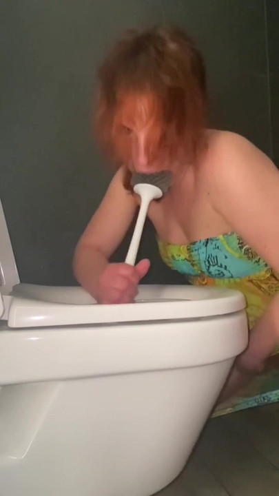 Captivating moment from "Licking public toilets in the hotel and playing with toilet brush"