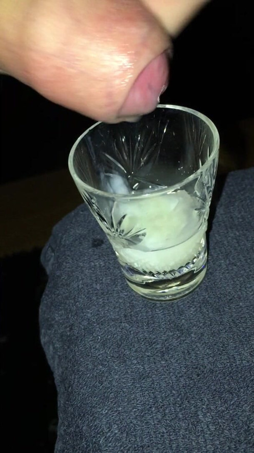 Cumshot in a shot glass
