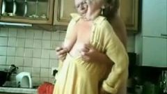 Se mum and step dad having fun in the kitchen. Stolen video