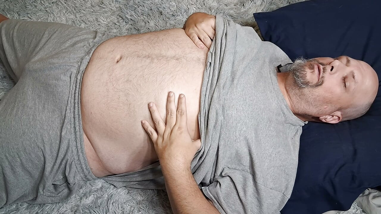 Chubby guy lays on floor and cums