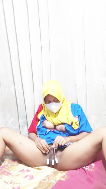 Memorable moment from "Hijab cashier Indomaret masturbates using dildo"