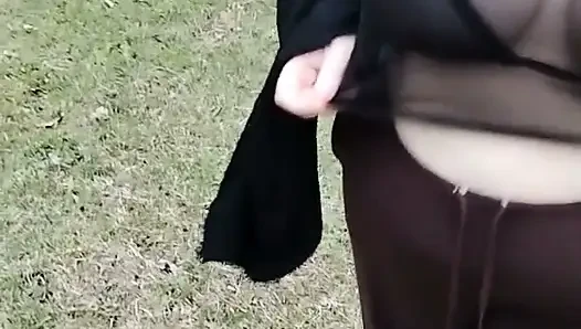 My stepmother walking in a transparent T-shirt.