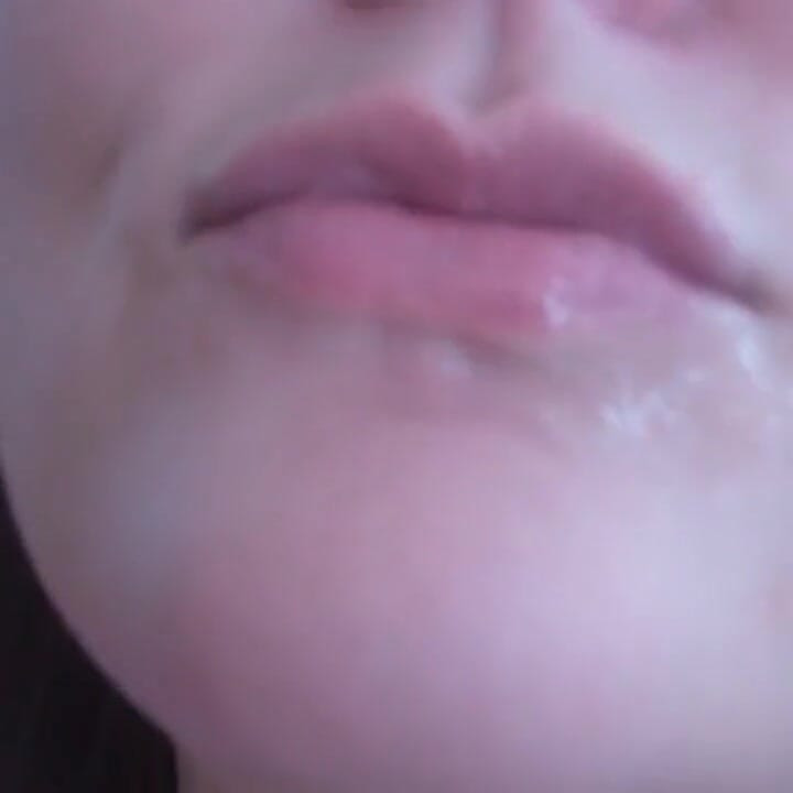 She is showing her pretty tongue in close up