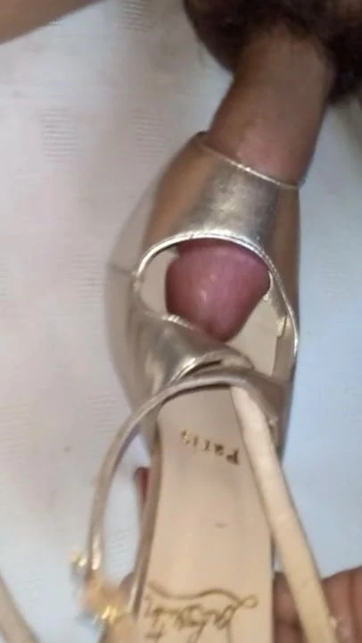 Fucking golden high heels shoejob