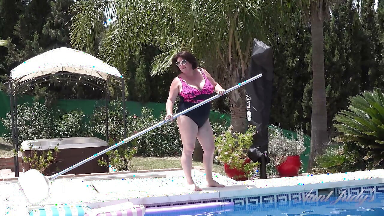 Busty Redhead MILF JoJo Robinson Goes Skinny Dipping in the Pool