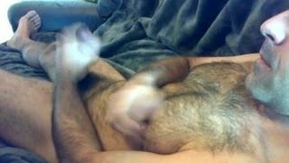 Sexy hairy man strokes