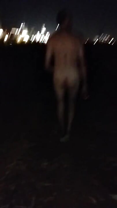 Naked Walking on the Hill Along Highway