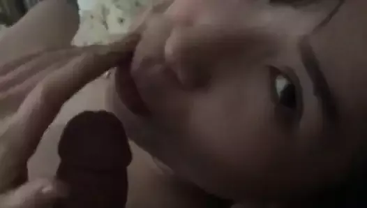 Cute Asian girlfriend giving blowjob