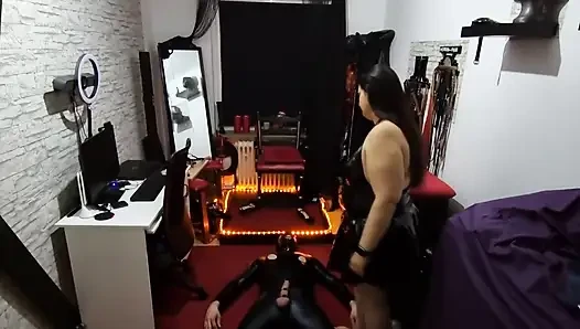 Latex Domme MILF Tramples Slave Dripping in Sweat