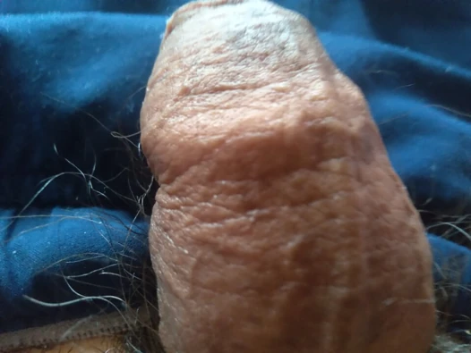 Young man with oil has a fetish for his penis