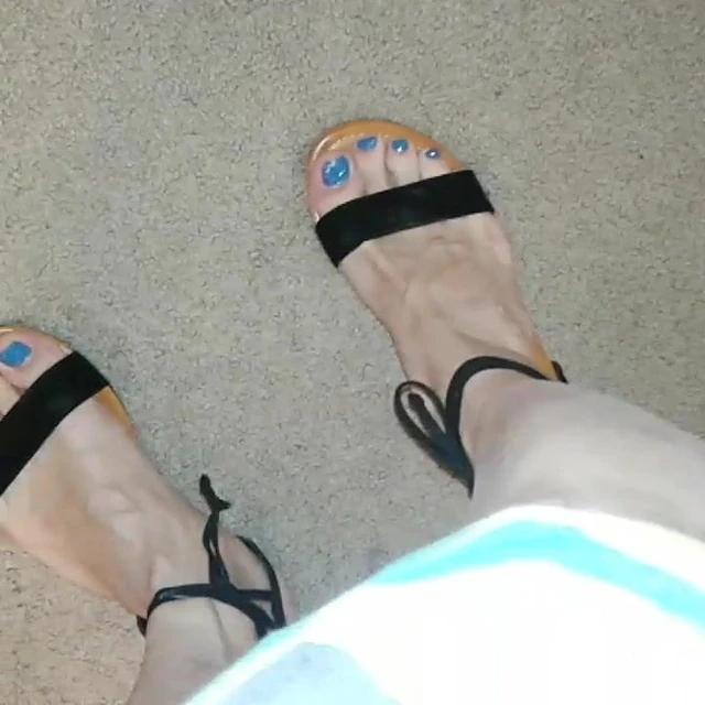 Blue toes in sandals