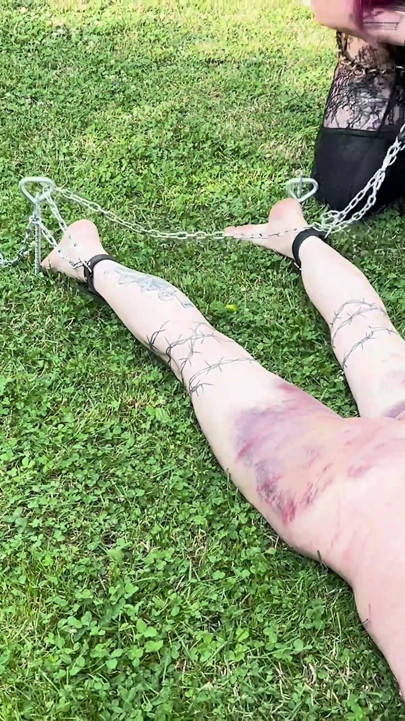 Double Female Domination with Already Heavy Bruised Slaven Who Receives More Corporal Punishment Outside in the Sun.