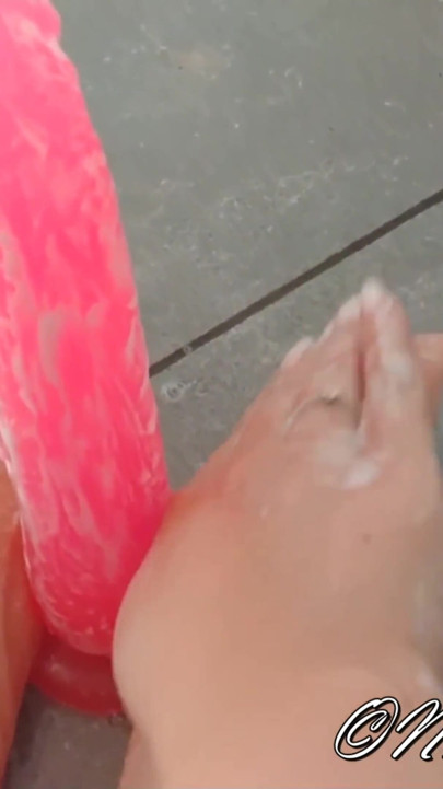 Dildo footjob in the shower with soap