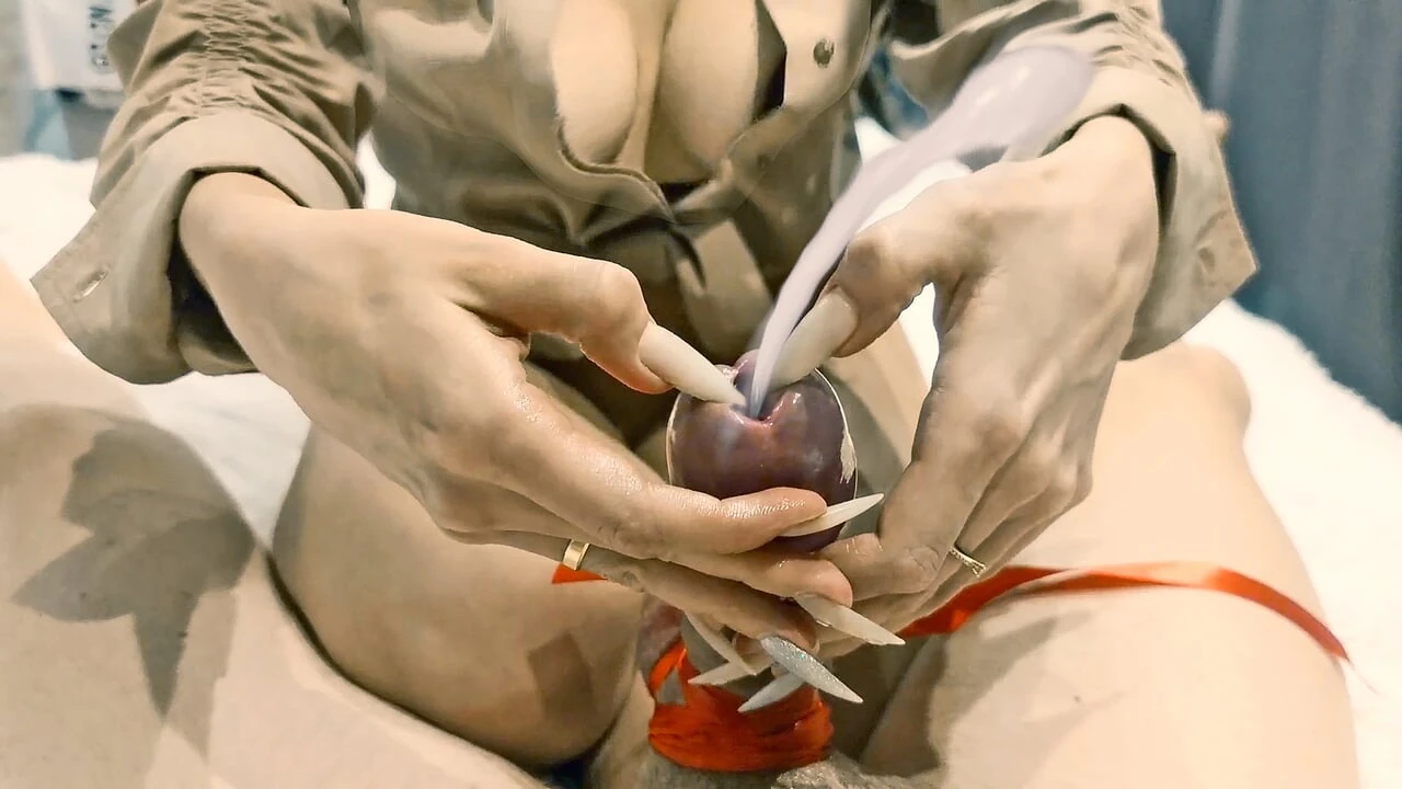 A milf stretches her stepson's urethra so he can cum easier.