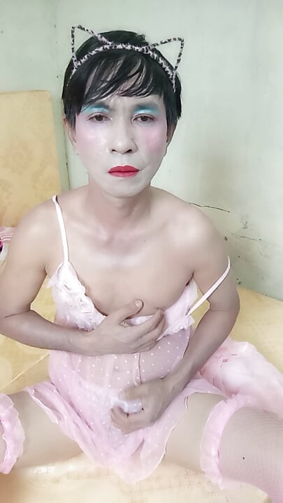 Oanh Le transgender wearing a sexy robe masturbating happily