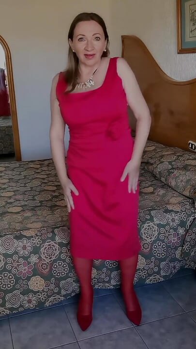 Hot MILF Teasing in Red Stockings and High Heels Shoes