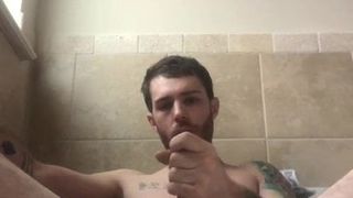hot tatted man plays with is ass and pumps out a load