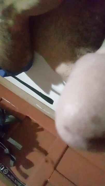 Man came out of the bathroom to get a straw in his room while no one is in his house