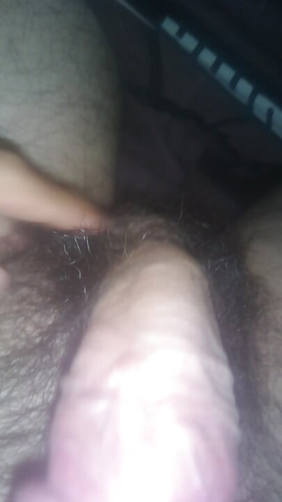 Man grops his cock under the covers
