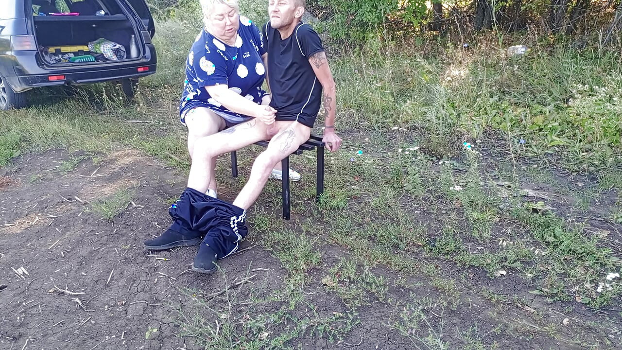 Stepmom in a public park jerks off my dick until I cum