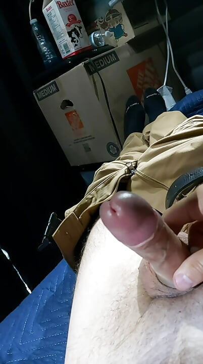 Masturbating