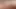 femme mature topless sur la plage se caaresse les seins