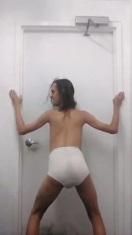 Twink in Tighty Whites gives himself small wedgies at work