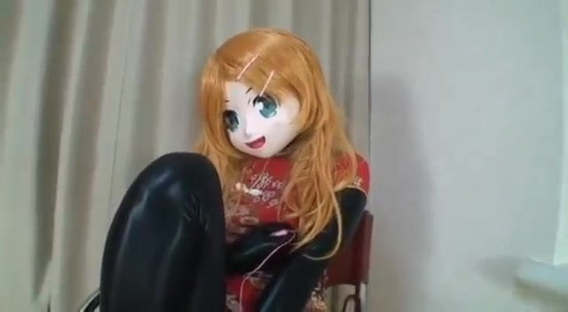 Latex kigurumi, vibrating.