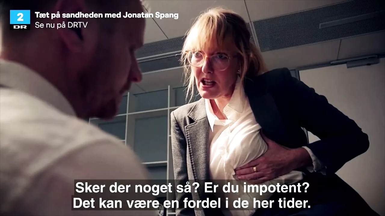 Danish mature Ditte Hansen pretends to lick nipple in skit