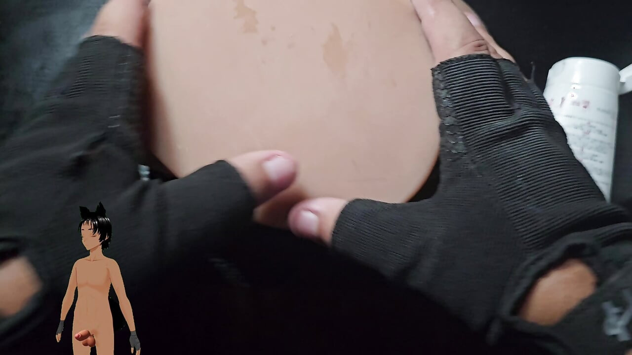 Playing with the pussy of a sex toy!