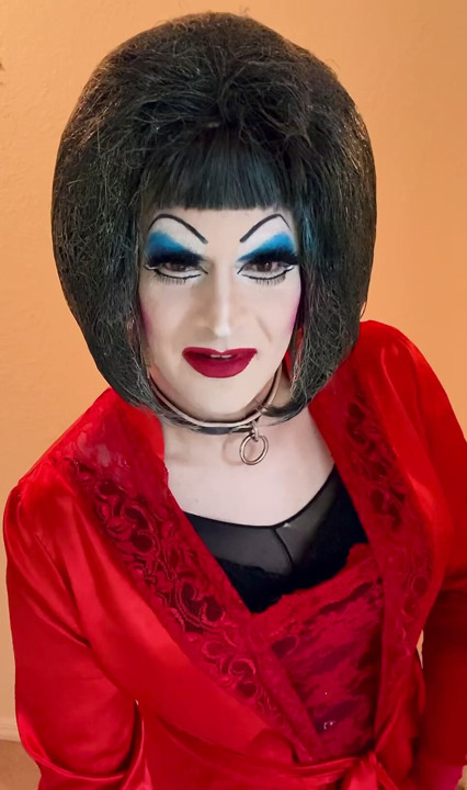 Dolled up sissy in heavy makeup and ready to please
