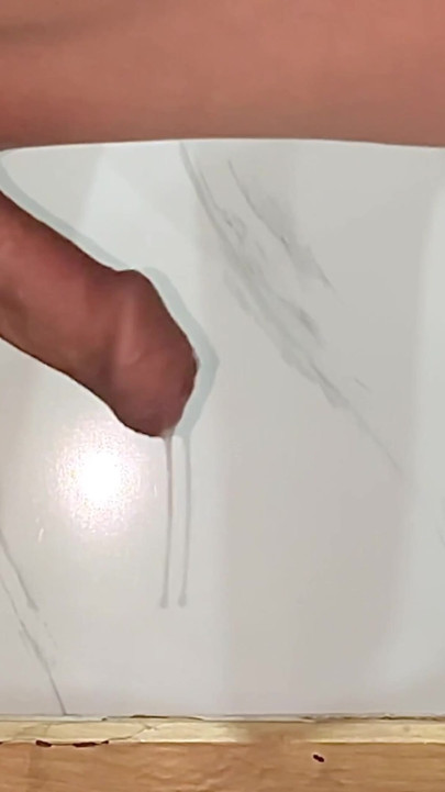 A boy exposes his large, foreskin-covered penis out the window of a high-rise apartment | Clip 1