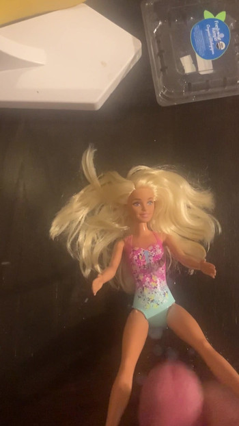 Jerking off over Barbie with cumshot