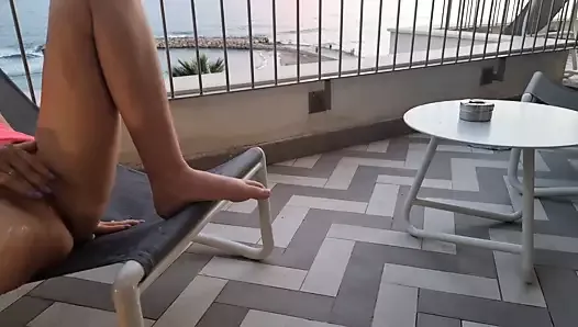 Flash and nude on the balcony – squirt fountain
