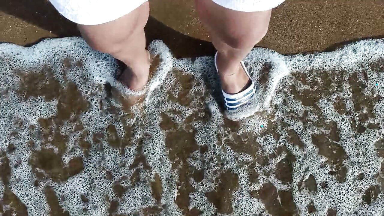Feet and the Sea Extra Slowmotion - One Foot Barefoot and Foot in Slide - Great Feet in Sea