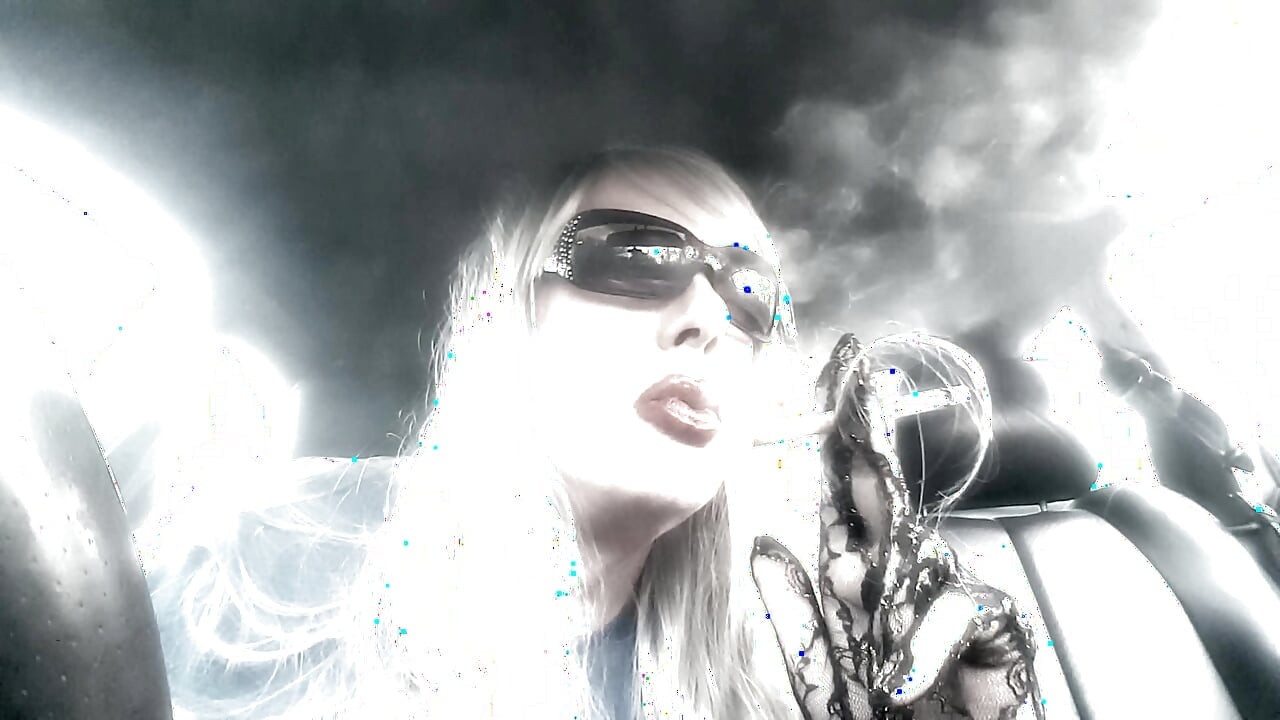 Mrs. Ruthie Dommie Mommy smoking Marlboro 100s in her car