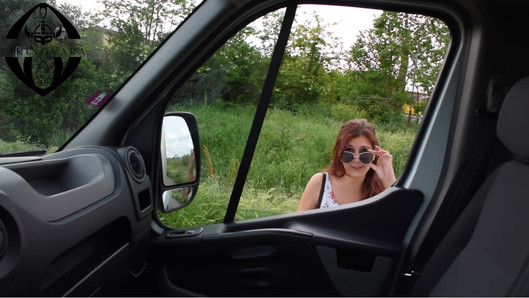 A truck driver gives a hitchhiker a ride