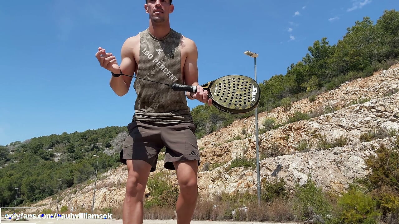 Fitness man training padel naked outdoor