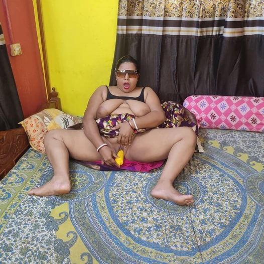 Indian horny mom fucking with dildo and pissing herself in her bedroom