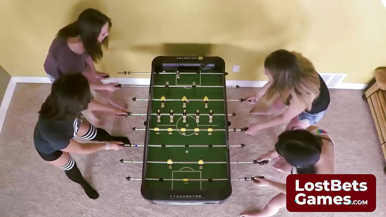 Breasts Were Quickly Exposed in a Playful Strip Foosball Game
